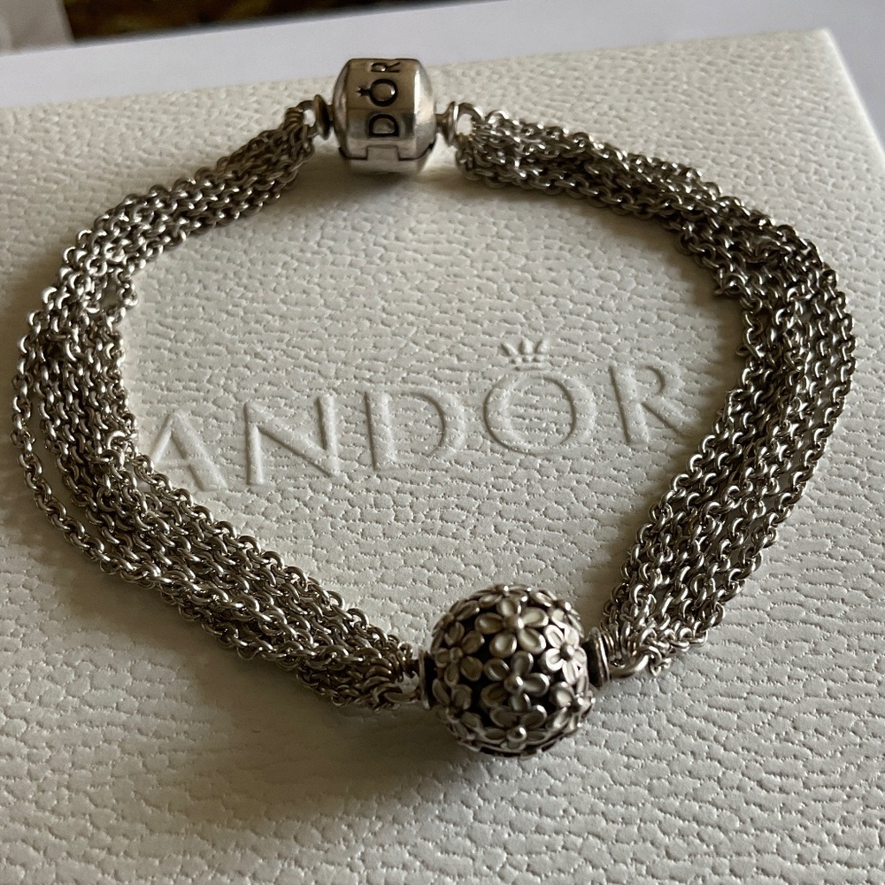 Pandora multi strain bracelet and white flower clasp charm